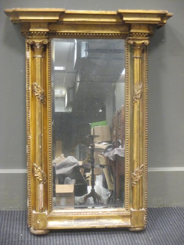 Lot 307 - A small columnar framed giltwood mirror 68 x 50cm