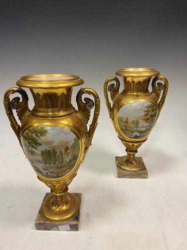 Lot 146 - A pair of Paris gilt vases with painted...