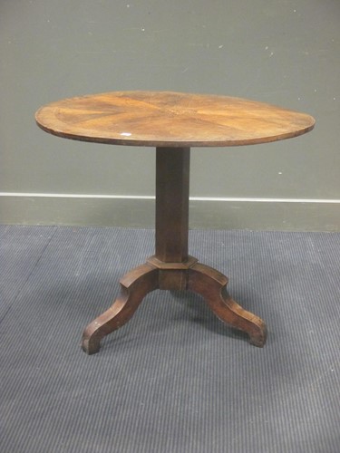 Lot 327 - A 19th century circular inlaid tilt-top table...