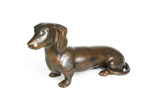 Lot 65 - *  A contemporary bronze model of a Dachshund