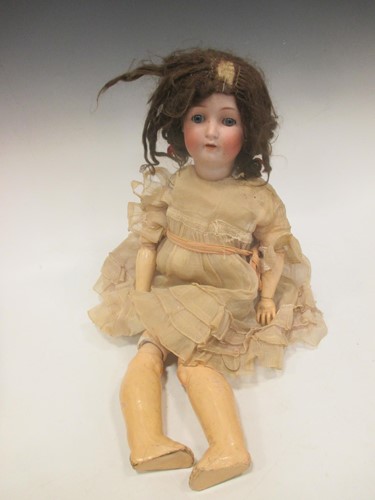 Lot 104 - A German bisque pottery head doll