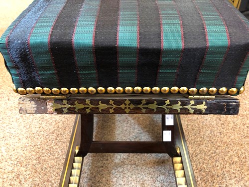 Lot 327 - A Regency rosewood and brass inlaid gout stool
