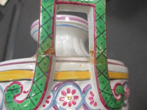 Lot 38 - A pair of continental faience two-handled...