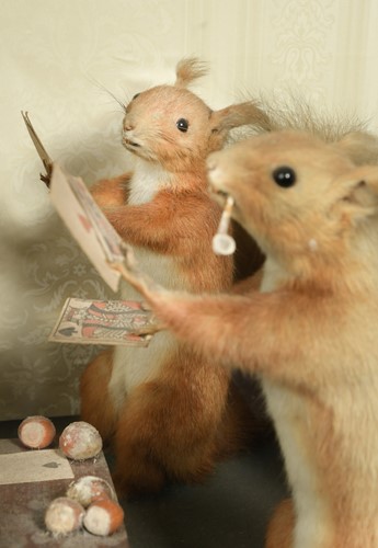 Lot 449 - Taxidermy, an anthropomorphic diorama of card playing and dancing Red Squirrels, early 20th century