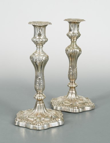 Lot 396 - A pair of George III silver candlesticks