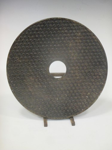 Lot 49 - A large Chinese soapstone Bi Disc, 30cm diameter
