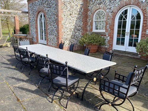 Lot 479 - A pair of marble top tables and ten chairs, 20th century