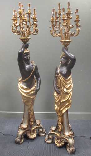 Lot 346 - A pair of composite blackamoor candelabras,...