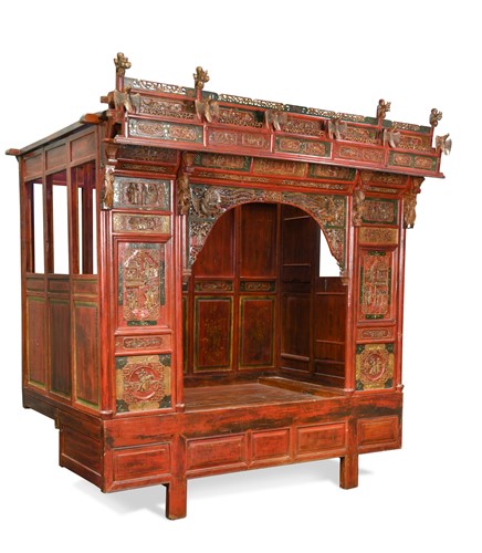Lot 559 - A Chinese red lacquer and painted bed, early to mid 20th century