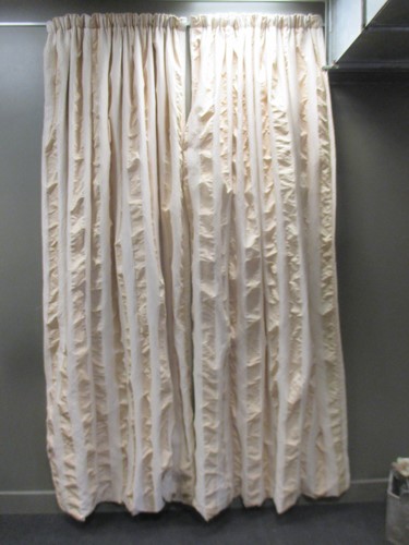 Lot 469 - A pair of verticle striped cream coloured...