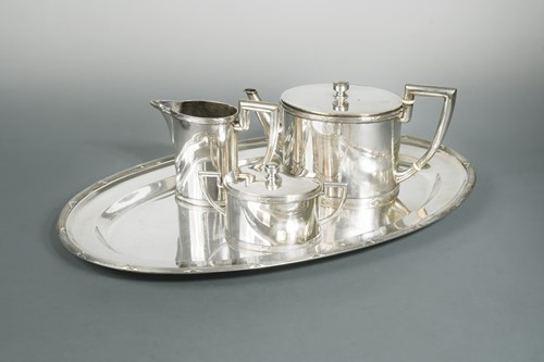 Lot 370 - An early 20th century Austrian metalwares silver three-piece tea set and tray