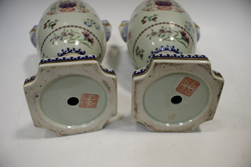 Lot 9 - A pair of Samson porcelain armorial vases,...