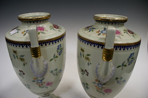 Lot 9 - A pair of Samson porcelain armorial vases,...