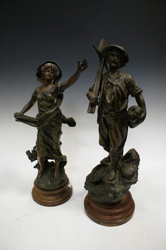 Lot 50 - A pair of spelter figures of land workers,...