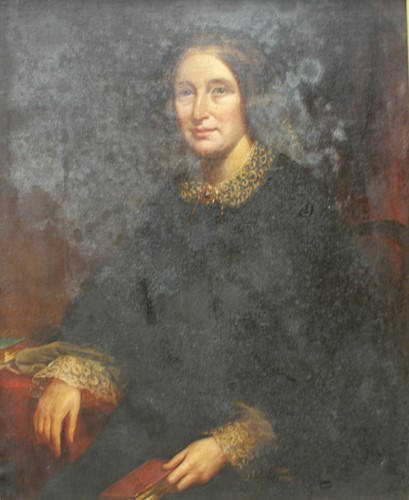 Lot 275 - A 19th century portrait of a lady, oil on...