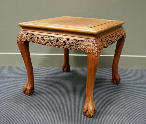 Lot 326 - A Chinese hardwood occasional table, carved...