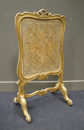 Lot 349 - A mid 19th century giltwood fire screen, 107 x...