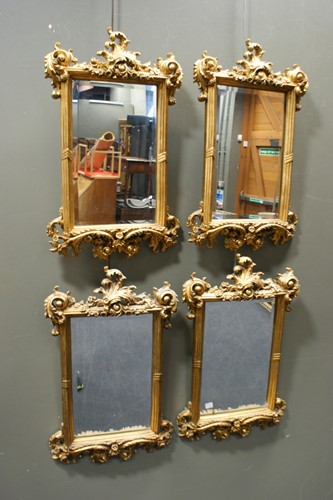 Lot 355 - Two pairs of small modern gilt wall mirrors,...