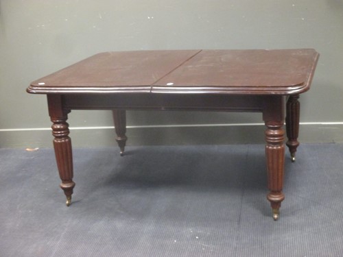 Lot 373 - A Victorian mahogany dining table, 71 x 106 x...