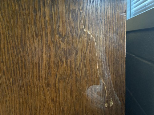 Lot 123 - An Arts & Crafts oak triple wardrobe, circa 1900