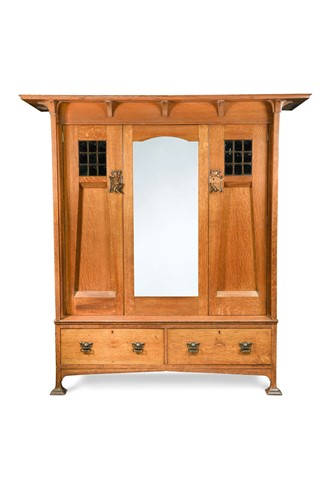 Lot 120 - Harris Lebus, an Arts & Crafts oak wardrobe