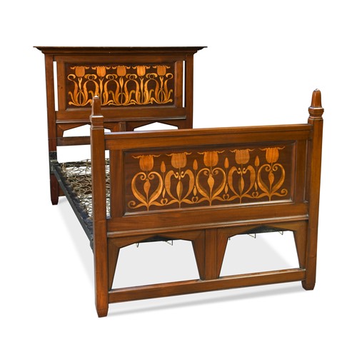 Lot 124 - An Arts & Crafts single bed by Shapland & Petter