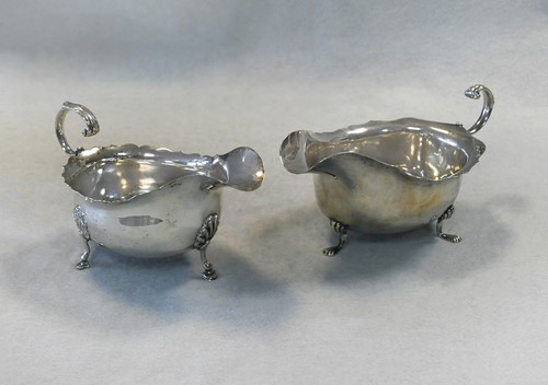 Lot 479 - Chester - Two similar Edward VII silver sauce boats