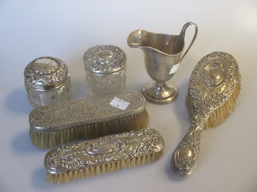 Lot 185 - A silver helmet style cream jug 3.5ozt,...