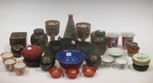 Lot 109 - A pair of Japanese beakers decorated with blue...