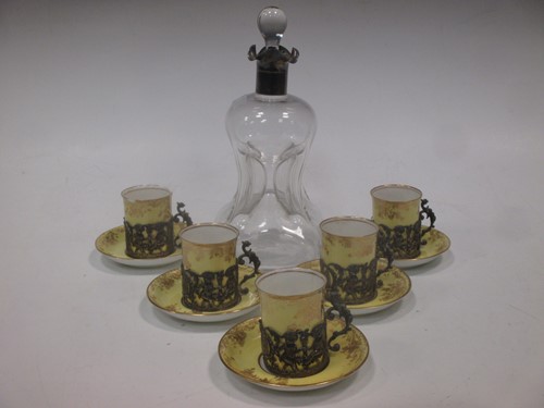 Lot 91 - A glug glug decanter with silver collar,...