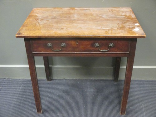 Lot 323 - A late Georgian mahogany side table, fitted a...