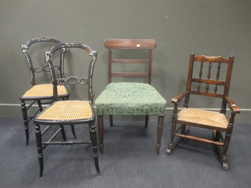 Lot 416 - A child’s stained beech rocking chair with...