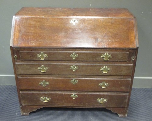 Lot 418 - A Victorian oak bureau, with fall front and...