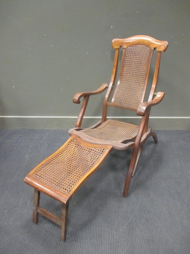 Lot 306 - An Edwardian teak folding garden chair with...