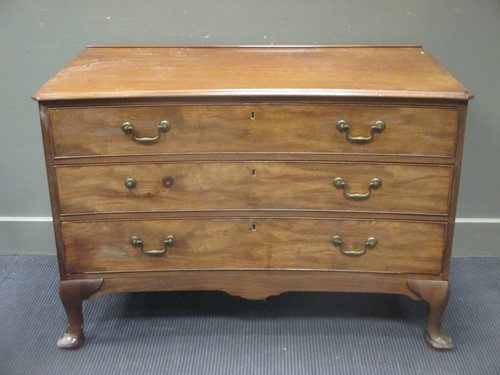 Lot 421 - A Georgian concave front chest, with pine...