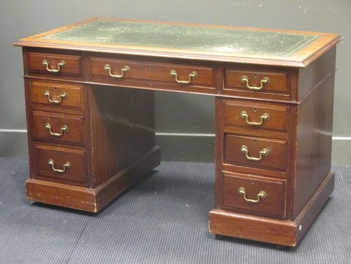 Lot 372 - An Edwardian mahogany twin pedestal desk...
