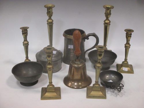 Lot 62 - A pair of 19th Century brass candlesticks with...