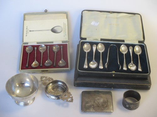 Lot 180 - 2 cased sets of six silver teaspoons and tongs,...