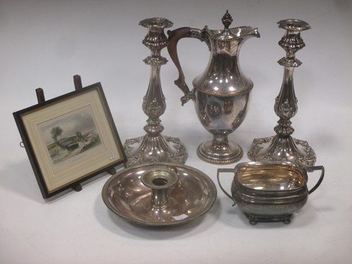 Lot 197 - A pair of plated candlesticks with floral and...