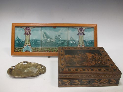 Lot 102 - An Art Nouveau three tile panel together with...