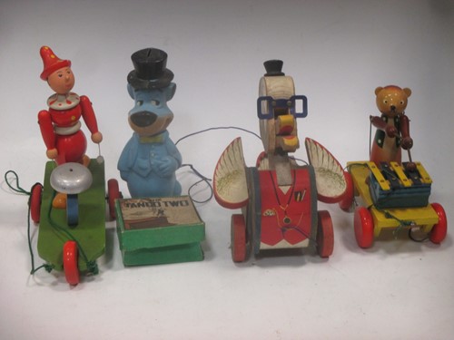 Lot 70 - A collection of mid 20th century toys; pull...