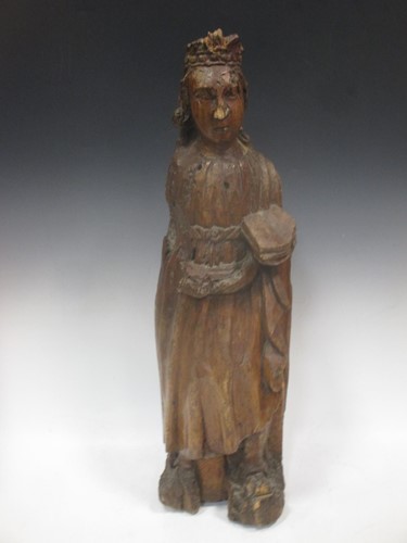 Lot 63 - A carved limewood saint, 17th century, 68cm high