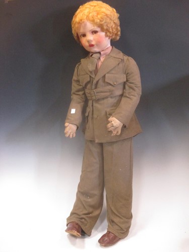 Lot 75 - A large near life size painted felt head doll...
