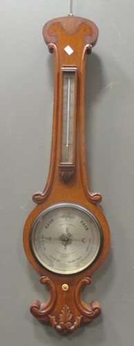 Lot 397 - A late Victorian carved oak banjo barometer,...