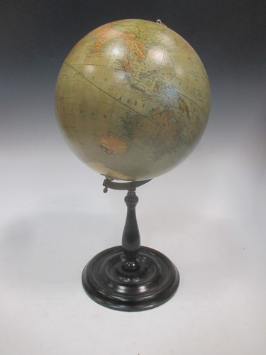 Lot 93 - A Victorian style globe on ebonised wood stand,...