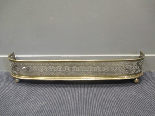 Lot 343 - A brass fender, 103cm long