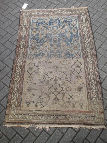 Lot 499 - Three small tribal rugs (2 modern), and...