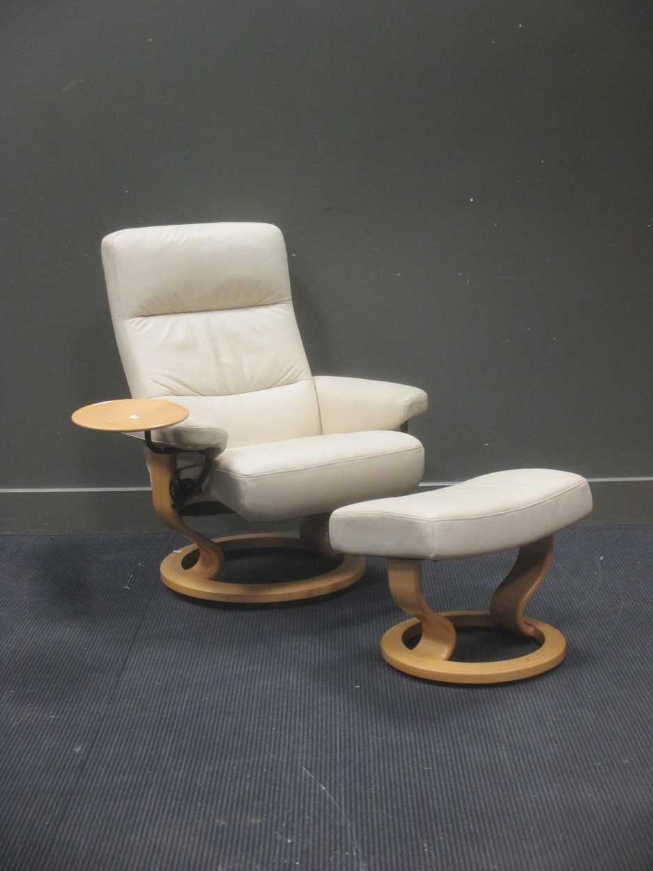 Lot 361 - An EKORNES "stressless" leather recliner with...