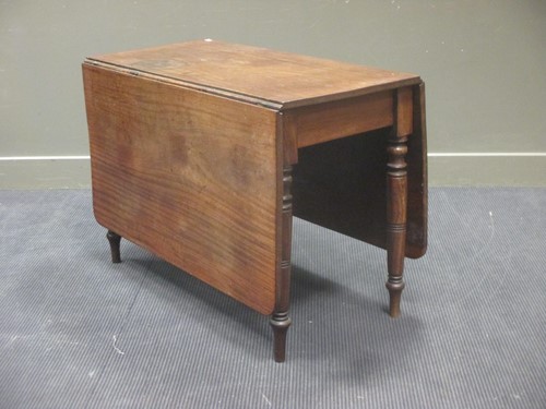 Lot 364 - A 19th century mahogany drop leaf dining table...