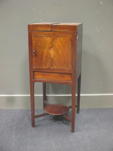 Lot 386 - An early 19th century mahogany and shell...